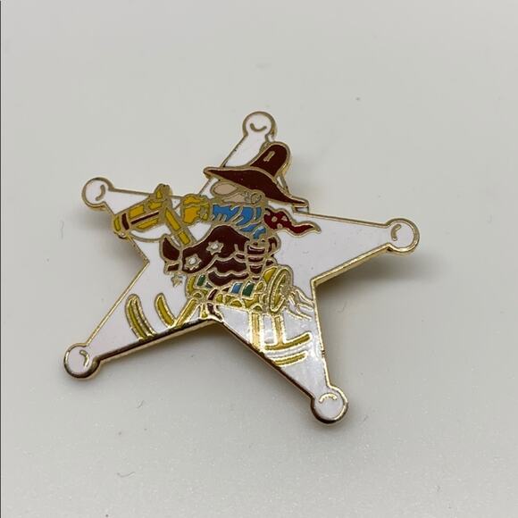 A cowboy on a Rockinghorse sheriff star pin - Picture 1 of 7